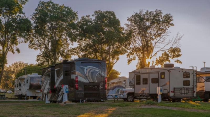 RVs parked at sunset